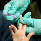 A nurse draws blood from a student in Flint, Michigan, to test for lead poisoning.